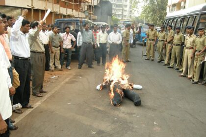 UTAA members burn an effigy of Social Welfare Minister, Sudin Dhavlikar near the residence of Chief Minister, Digambar Kamat on Tuesday.     Photo by Santosh Mirajkar