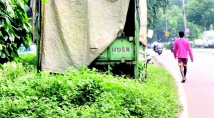 Unattended vehicles force  pedestrians to walk on road