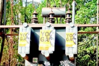 Unauthorised posters pasted on private properties during peak season raise concerns among locals