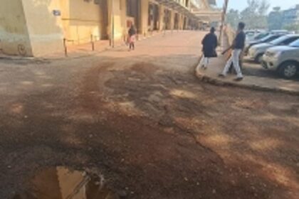 Urgent Road Repairs Needed at Mapusa District Hospital Entrance Due to Potholes