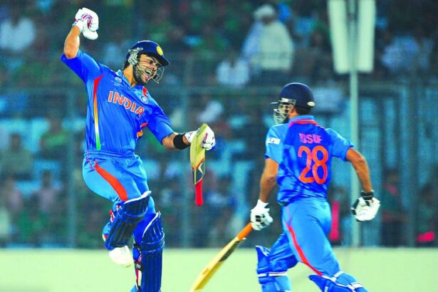 Virat Kohli reacts after scoring a century during the first match of the World Cup cricket tournament between Bangladesh and India. Man-of-match Virender Sehwag scored 175.