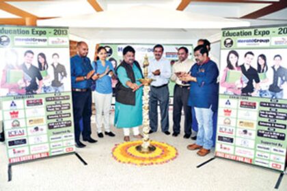 Vishnu Surya Wagh, MLA and chairman of Kala Academy lighting the traditional lamp