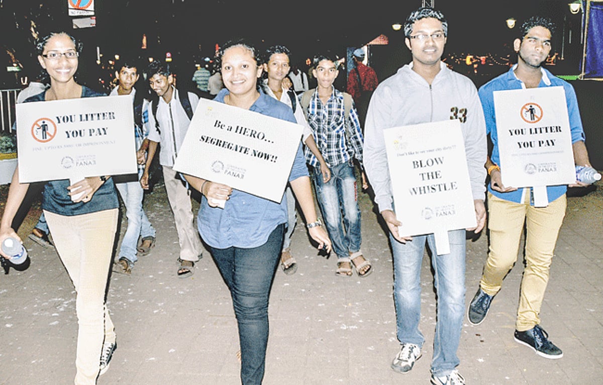 WHISTLE BLOWERS: Dempo College students walk with placards cautioning public not to litter along the promenade and IFFI venues in Panjim on Thursday.