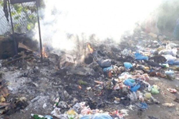 Waste-piled black spot set on fire by unknown at Fatorda