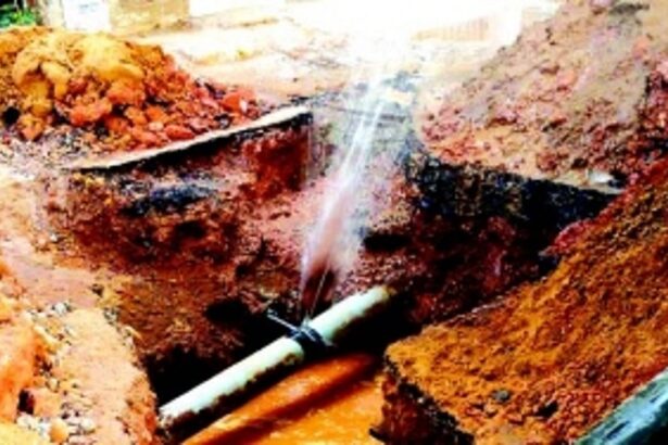 Water gushes down the drain from ruptured pipeline at Miramar