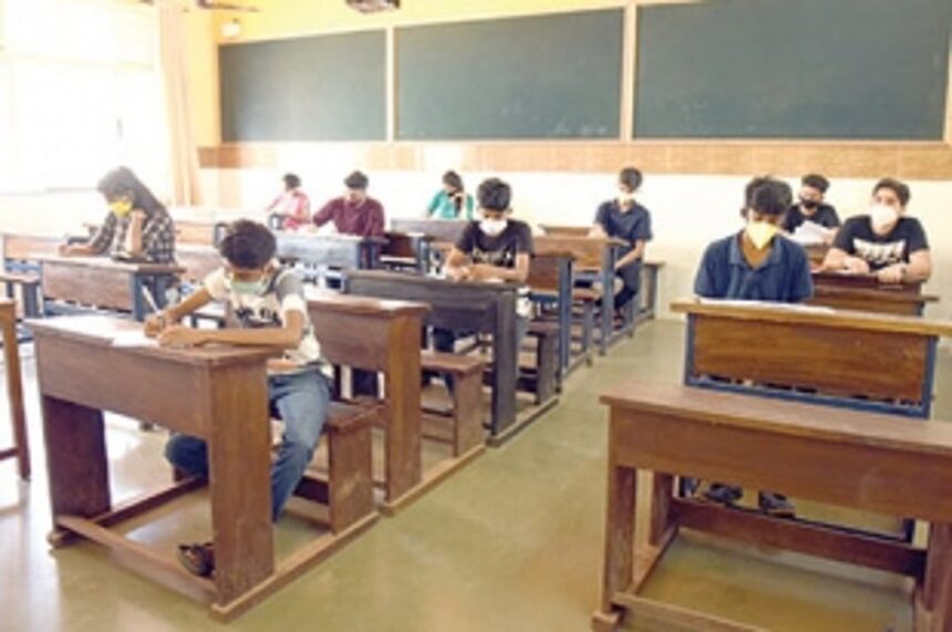 Wearing masks students answer first paper of SSC exam