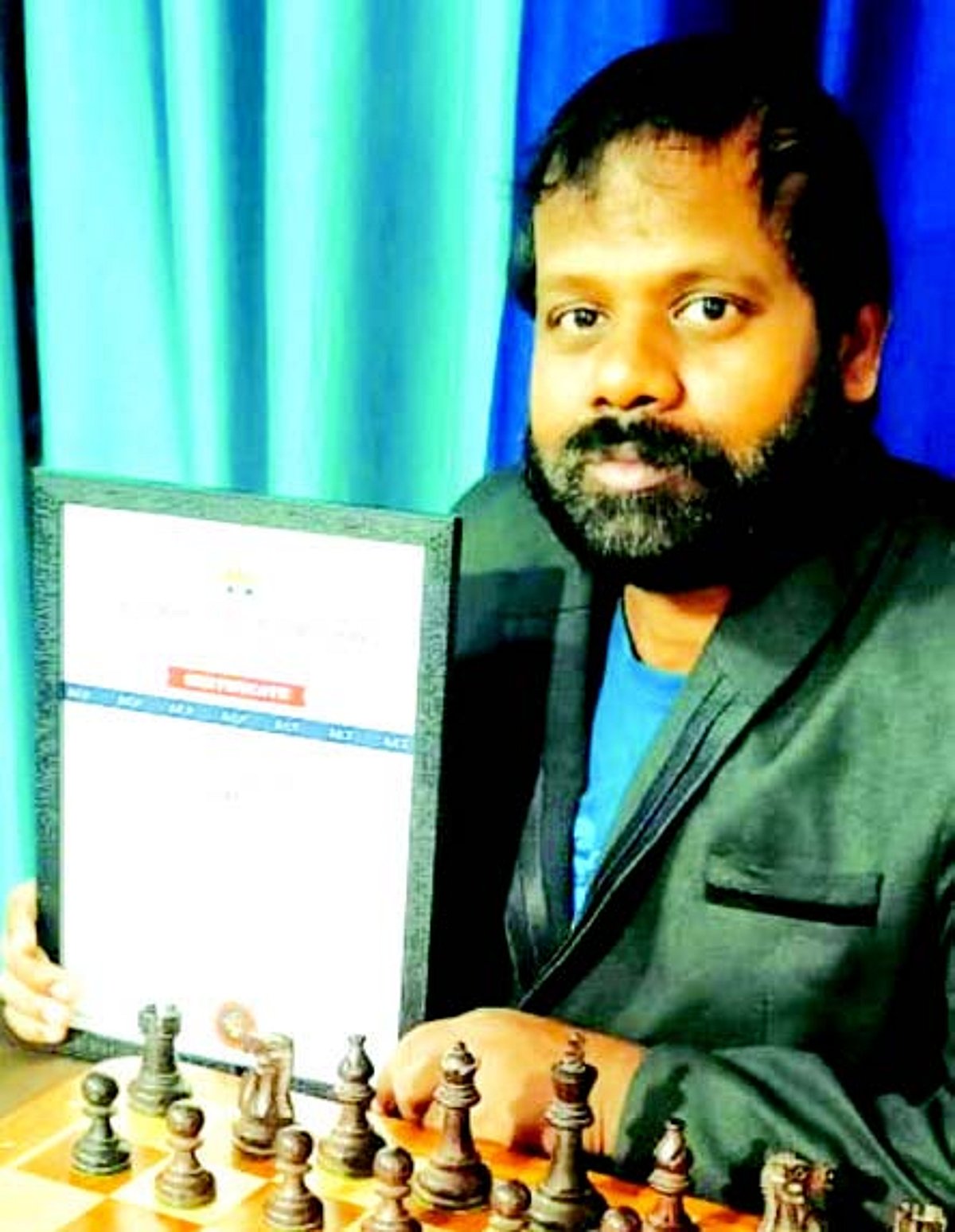 Wilson achieves Sr Nat Arbiter title in chess