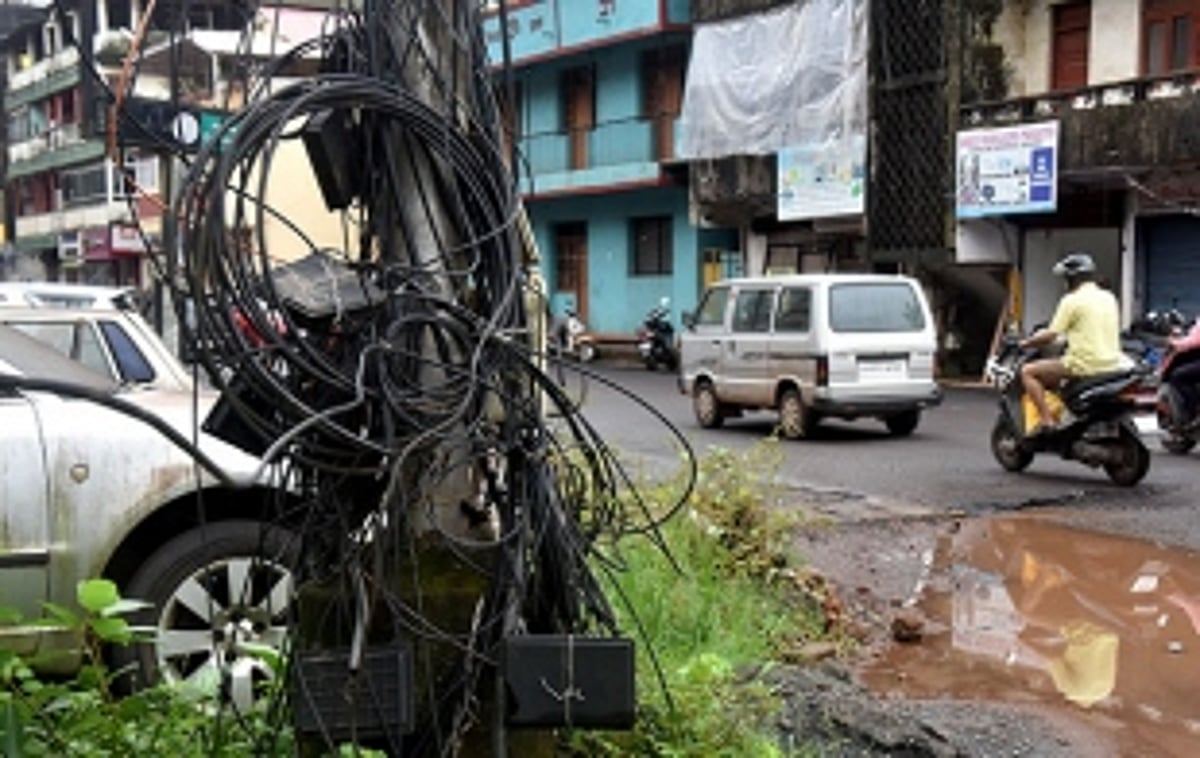 Wires, cables hanging precariously from electric  poles on St Inez road pose treat to residents