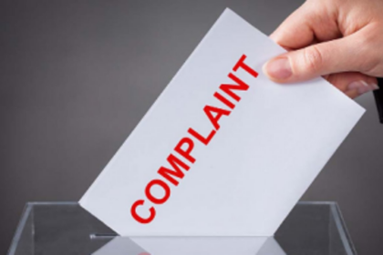 Workers hold   rally, allege   harassment by   automobile co