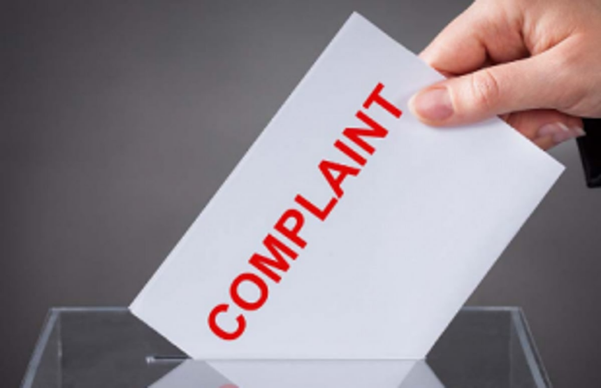 Workers hold   rally, allege   harassment by   automobile co