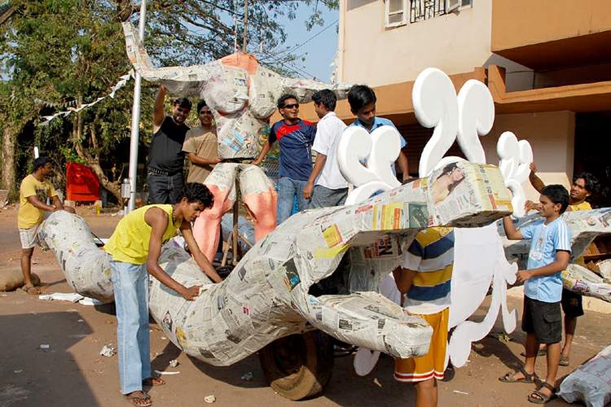 Youth from Mala, Panjim give final touches to a float, which will be paraded at the upcoming Carnival celebrations in the State.