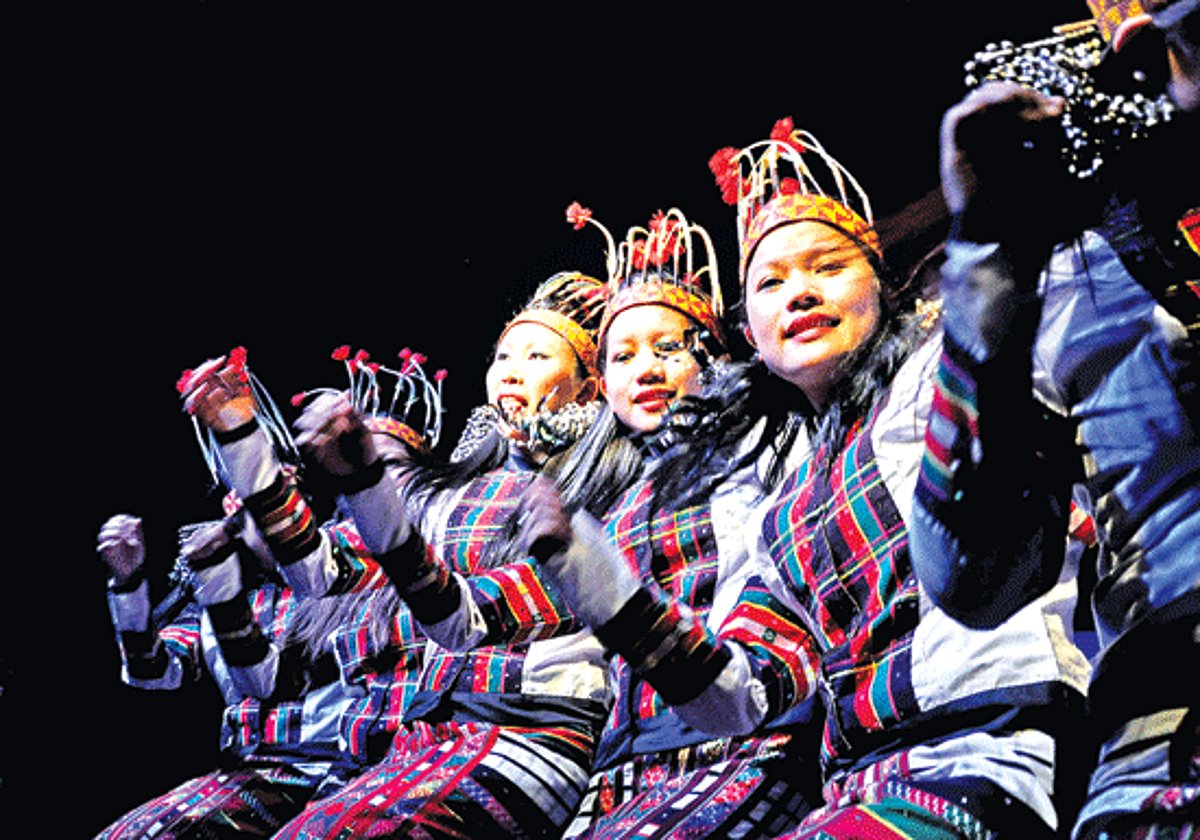 music in motion: Artistes from North East perform folk dance along the promenade as part of the 44th IFFI celebrations in Panjim on Monday.