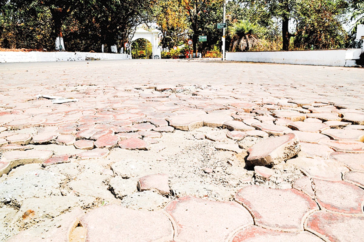 shoddy works: Inter-locking pavement tiles have been dislodged opposite the Raj Bhavan at Dona Paula.