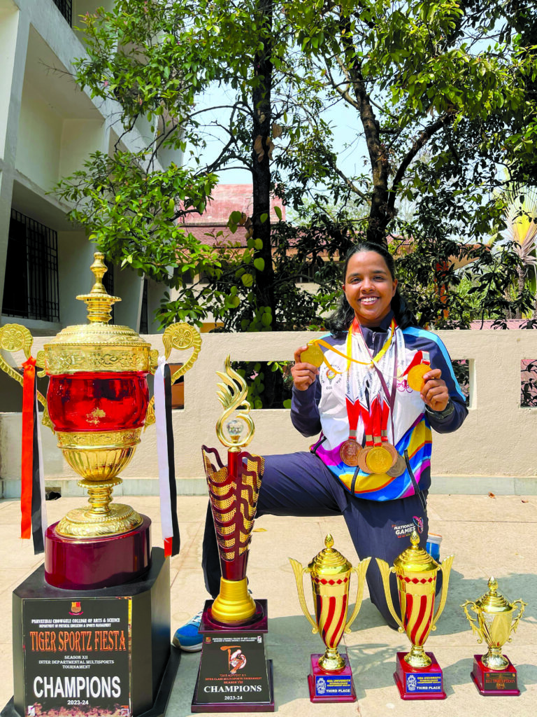 Success comes in battalions to Shiroda girl 2 Ratika with her sports medals and trophies 1