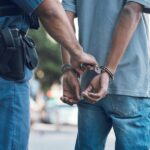 handcuffs police hands police man with criminal city justice crime corruption illegal arrest law enforcement officer with suspect thief gangster jail robbery fail 590464 209122