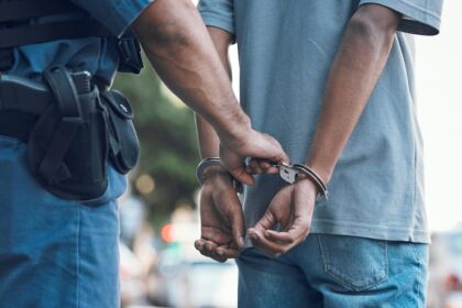 handcuffs police hands police man with criminal city justice crime corruption illegal arrest law enforcement officer with suspect thief gangster jail robbery fail 590464 209122