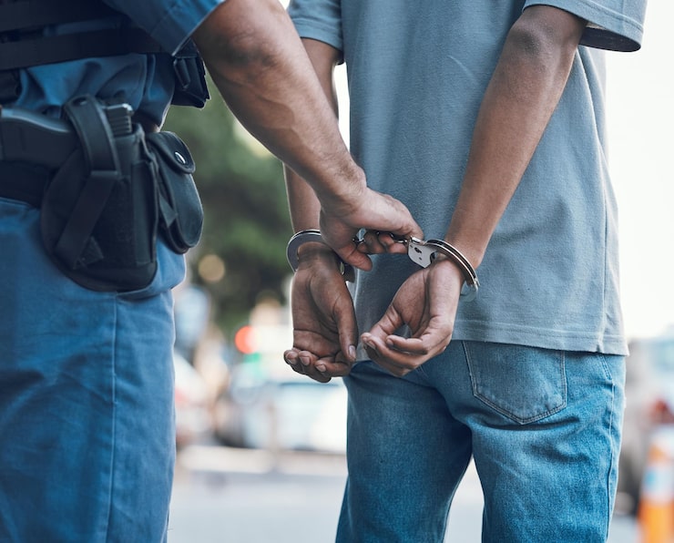 Goa Police Arrest Man in Multi-Year Assault Case 1 handcuffs police hands police man with criminal city justice crime corruption illegal arrest law enforcement officer with suspect thief gangster jail robbery fail 590464 209122