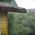 storm rain drips down from the roof picture id1160710991